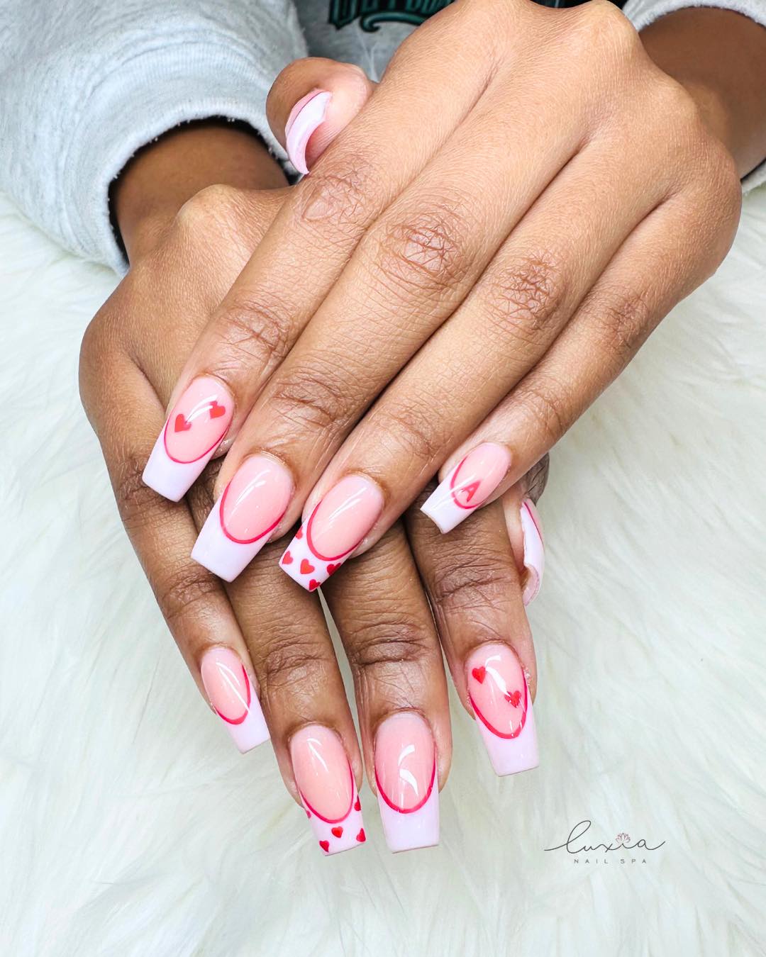 Luxia Nail Spa - Sam Rittenberg Blvd. logo